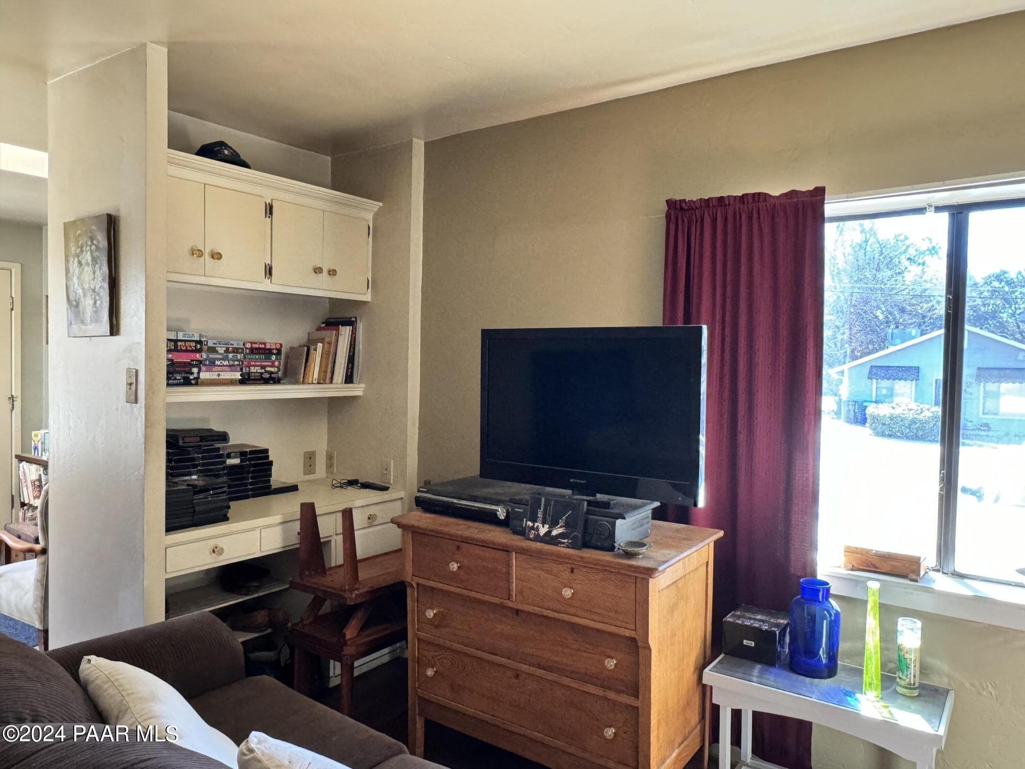 201 Robinson Drive Prescott, AZ 86303 - Photo 30 of 52 a room with furniture and a flat screen tv