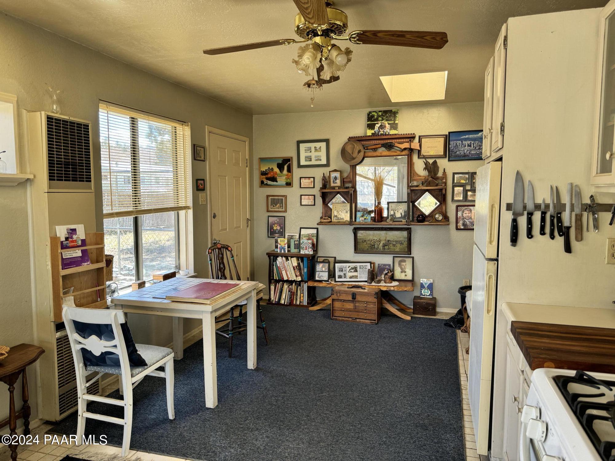 201 Robinson Drive Prescott, AZ 86303 - Photo 35 of 52 a view of a dining room with furniture and window