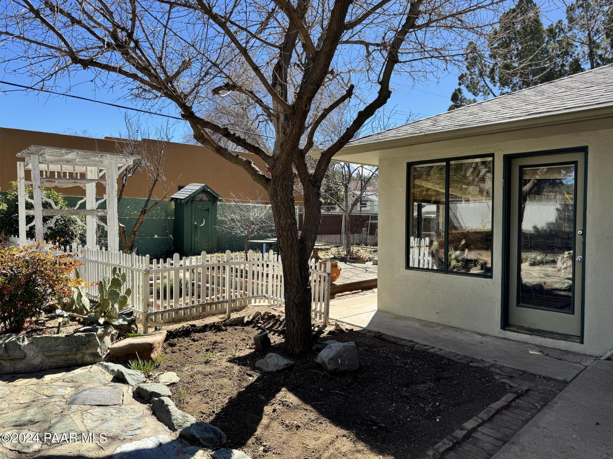 201 Robinson Drive Prescott, AZ 86303 - Photo 47 of 52 a view of a house with a large tree