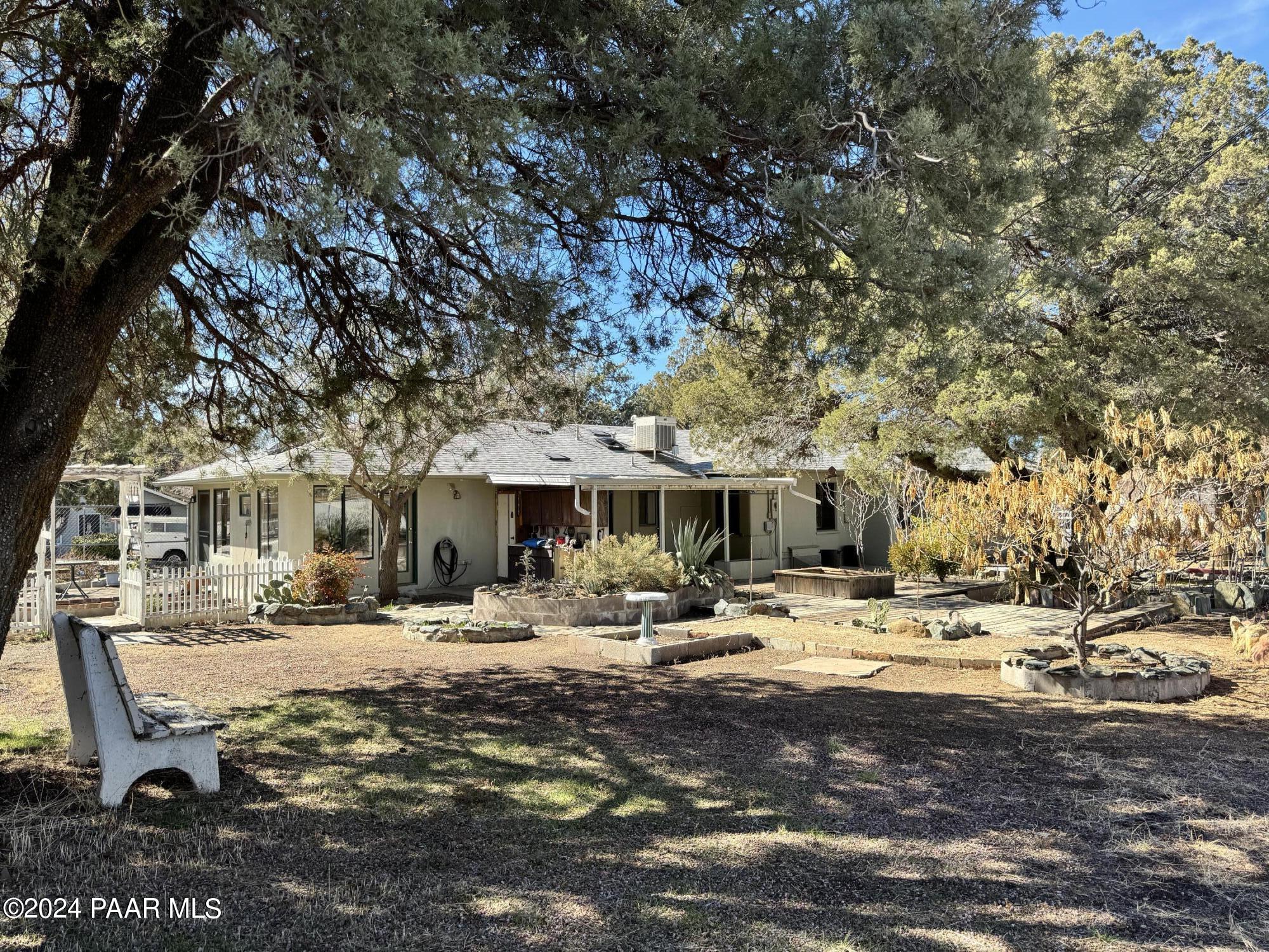 201 Robinson Drive Prescott, AZ 86303 - Photo 51 of 52 a table and chairs under an umbrella