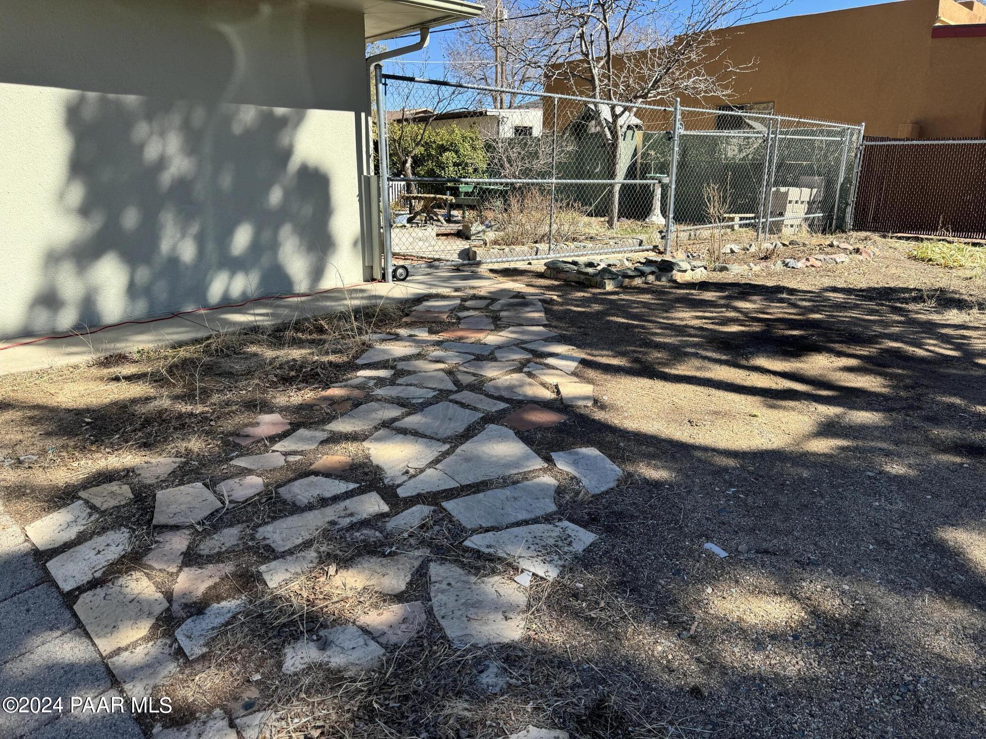 201 Robinson Drive Prescott, AZ 86303 - Photo 10 of 52 a view of a house with a yard