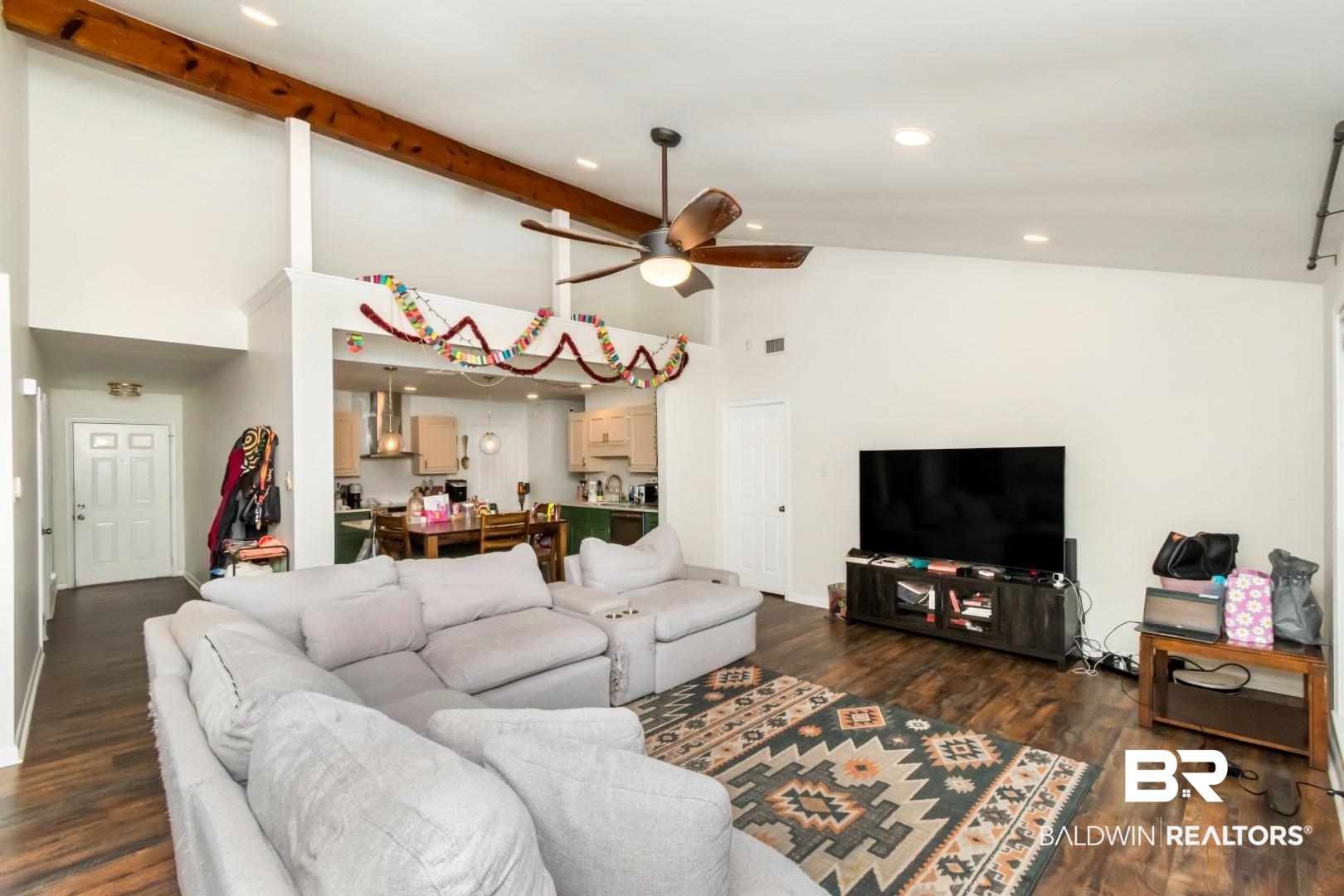 6208 Cottage Hill Road Mobile, AL 36609 - Photo 8 of 20 Living room featuring dark wood-style flooring, lofted ceiling, ceiling fan, and recessed lighting