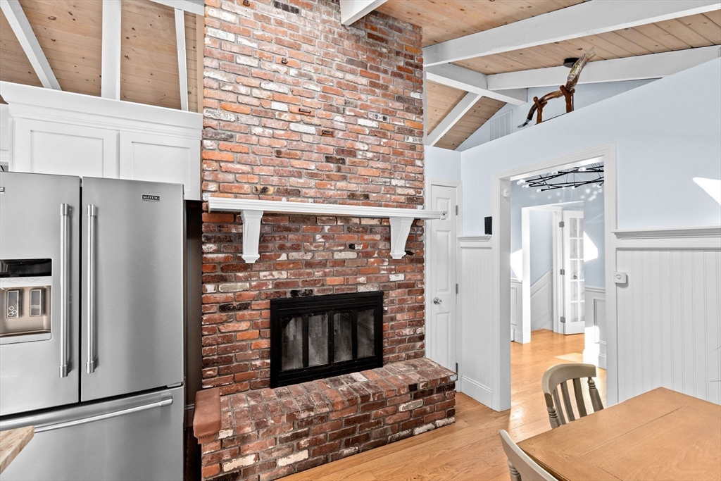 27 Everett Street Norfolk, MA 02056 - Photo 11 of 37 a kitchen with stainless steel appliances granite countertop a refrigerator a stove and a refrigerator