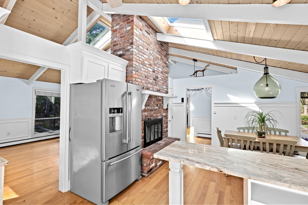 27 Everett Street Norfolk, MA 02056 - Photo 12 of 37 a kitchen with stainless steel appliances granite countertop a refrigerator a oven and a sink