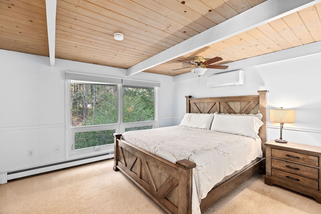 27 Everett Street Norfolk, MA 02056 - Photo 14 of 37 a bed sitting in a spacious bedroom next to a window