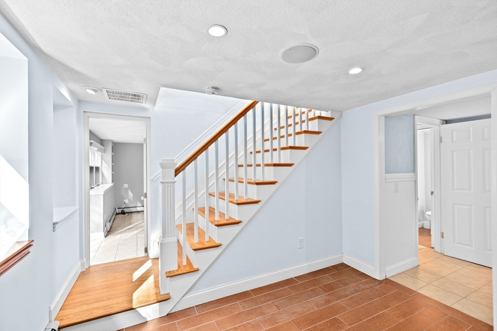 27 Everett Street Norfolk, MA 02056 - Photo 17 of 37 a view of entryway and hall with wooden floor