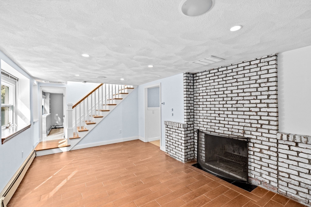 27 Everett Street Norfolk, MA 02056 - Photo 18 of 37 a view of entryway and hall with wooden floor