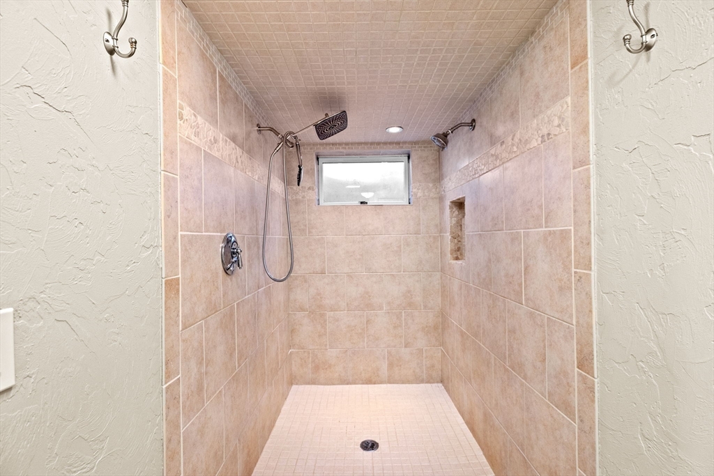 27 Everett Street Norfolk, MA 02056 - Photo 25 of 37 a bathroom with a shower