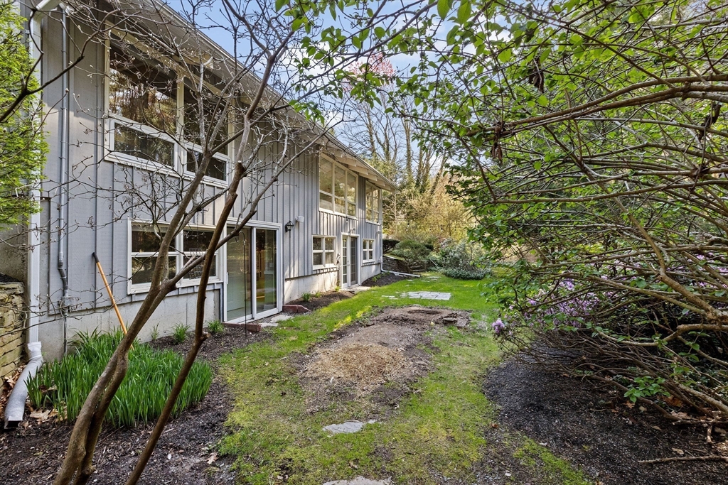 27 Everett Street Norfolk, MA 02056 - Photo 26 of 37 a house that has a tree in it