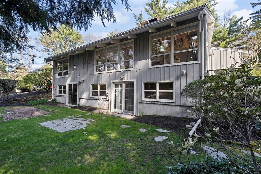 27 Everett Street Norfolk, MA 02056 - Photo 28 of 37 a view of a house with a yard and sitting area