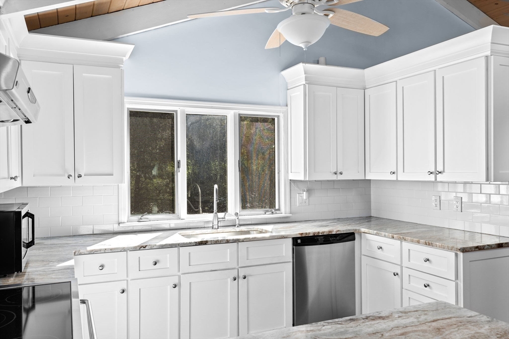 27 Everett Street Norfolk, MA 02056 - Photo 7 of 37 a kitchen with granite countertop white cabinets and white appliances