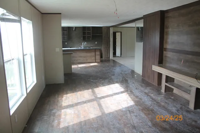 a view of a room with a fireplace