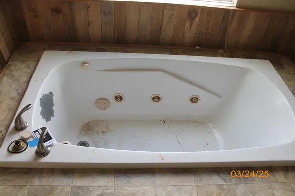 a bathroom with a sink and toilet