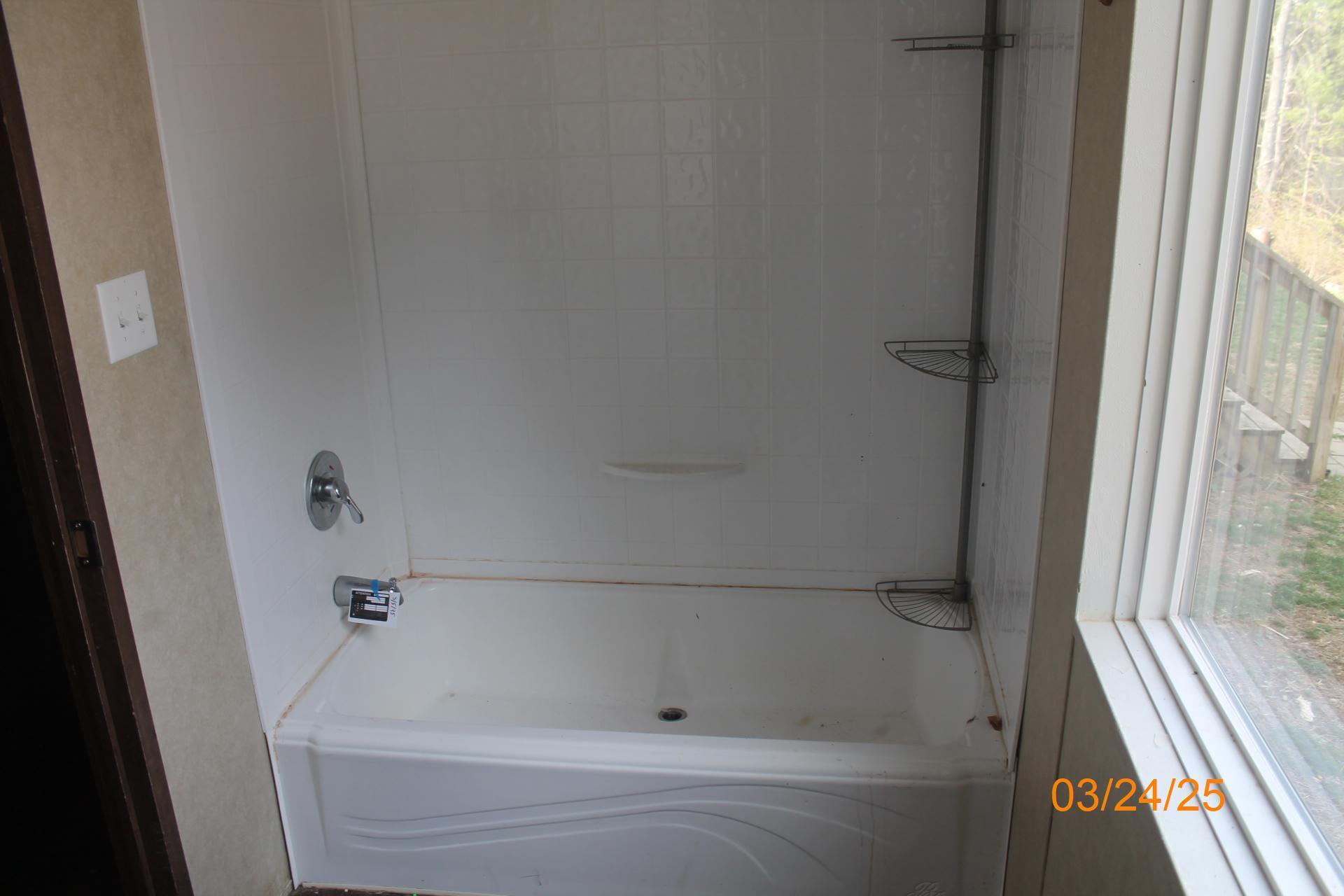 1935 Lick Ridge Road Northeast Check, VA 24072 - Photo 24 of 30 a bathroom with a bathtub