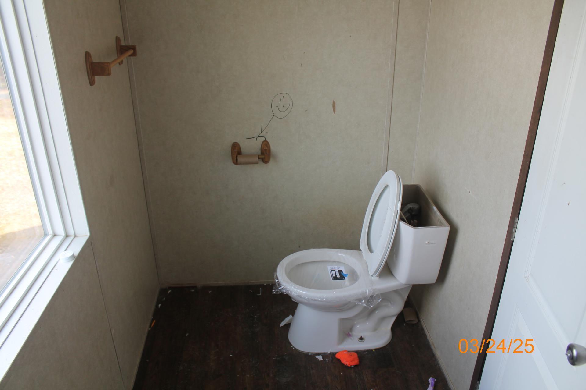 1935 Lick Ridge Road Northeast Check, VA 24072 - Photo 25 of 30 a bathroom with a sink and toilet