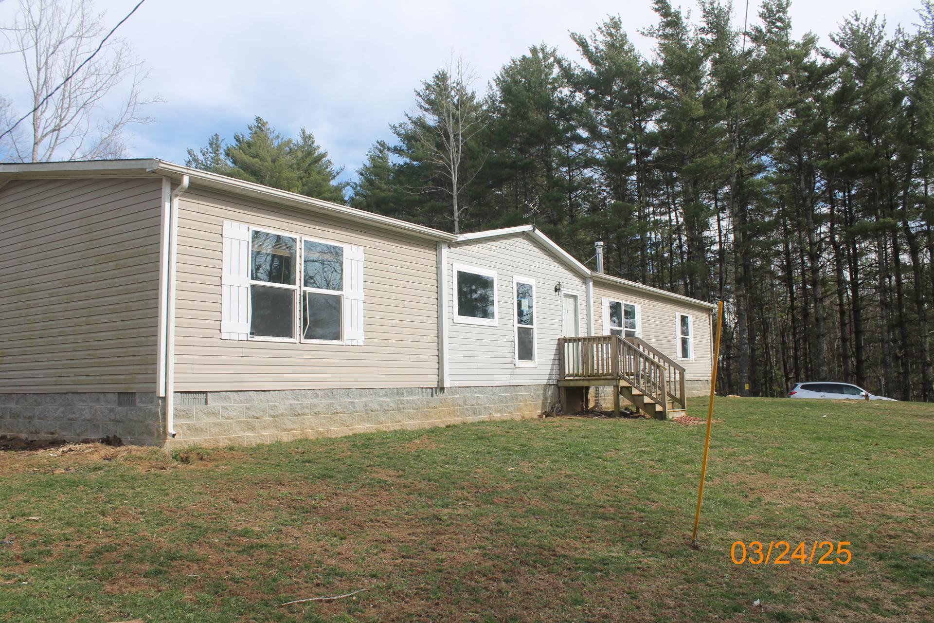 1935 Lick Ridge Road Northeast Check, VA 24072 - Photo 4 of 30 a view of a house with a yard