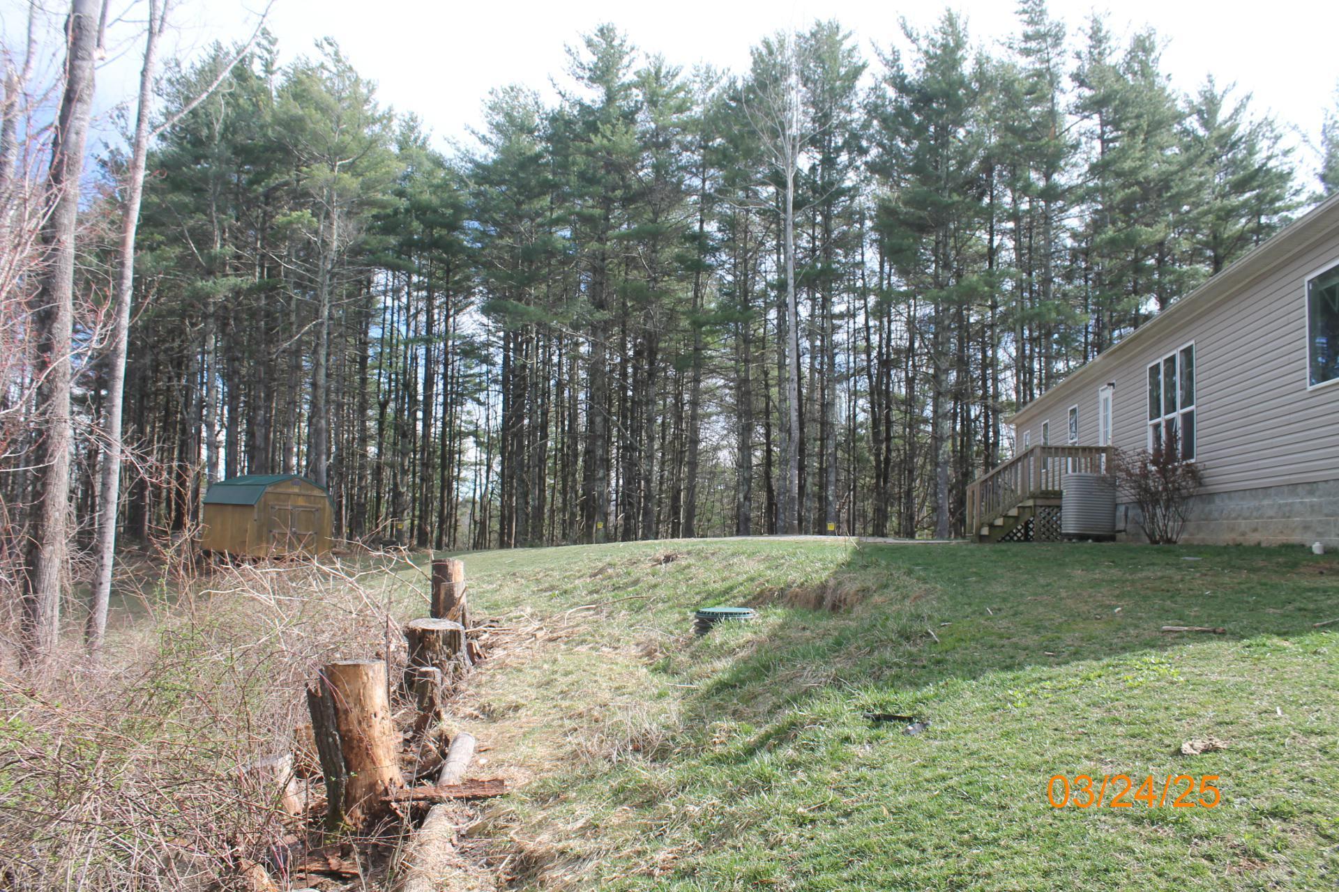 1935 Lick Ridge Road Northeast Check, VA 24072 - Photo 8 of 30 a view of a backyard of the house