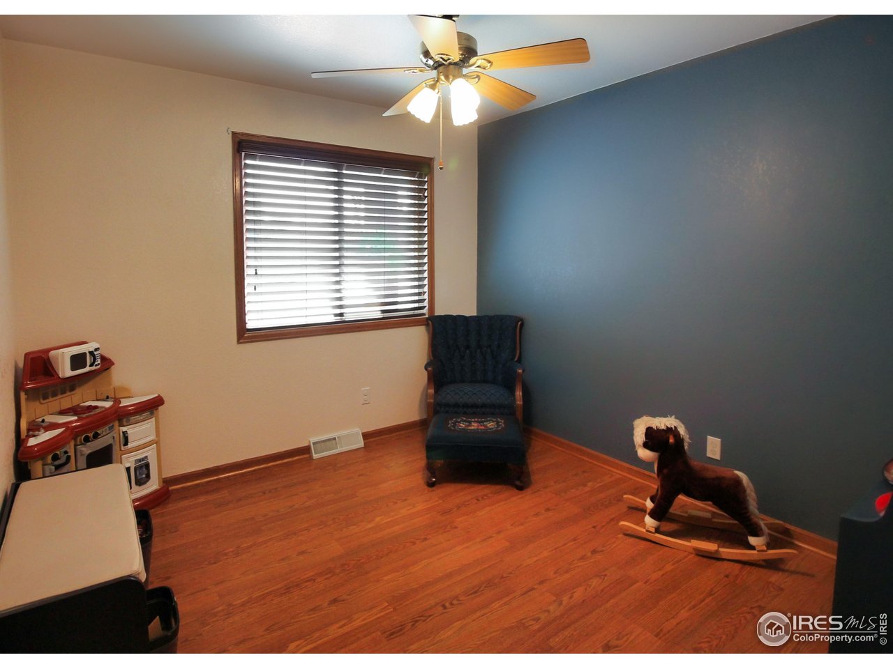14363 Dakota Road Sterling, CO 80751 - Photo 17 of 40 a room with furniture and a window