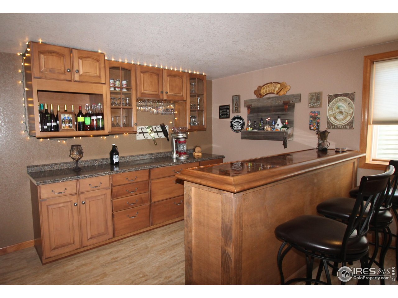 14363 Dakota Road Sterling, CO 80751 - Photo 20 of 40 a open kitchen with stainless steel appliances granite countertop a sink and a cabinets