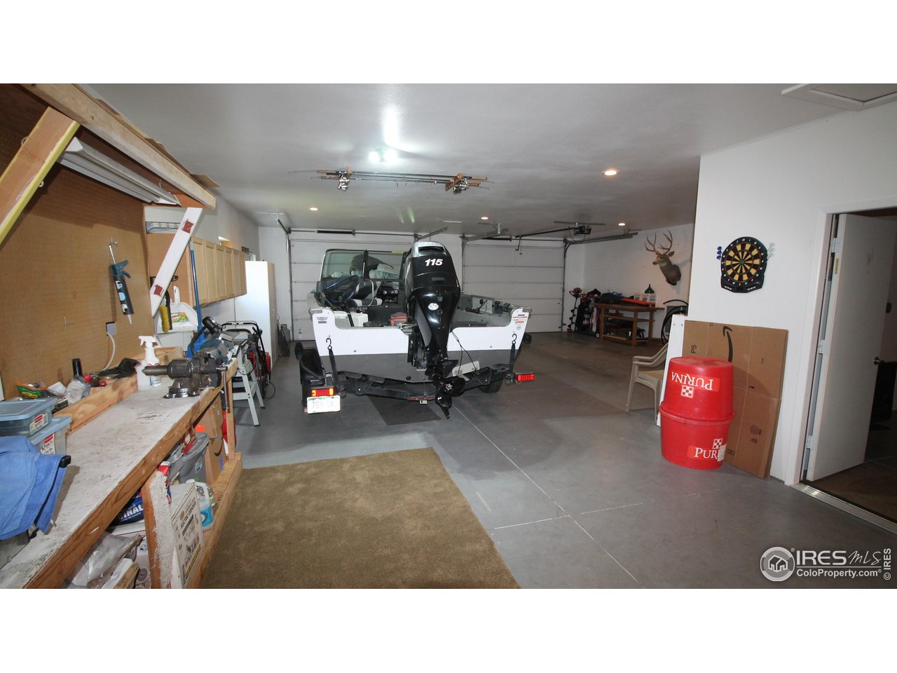 14363 Dakota Road Sterling, CO 80751 - Photo 28 of 40 a room with lots of furniture and clutter