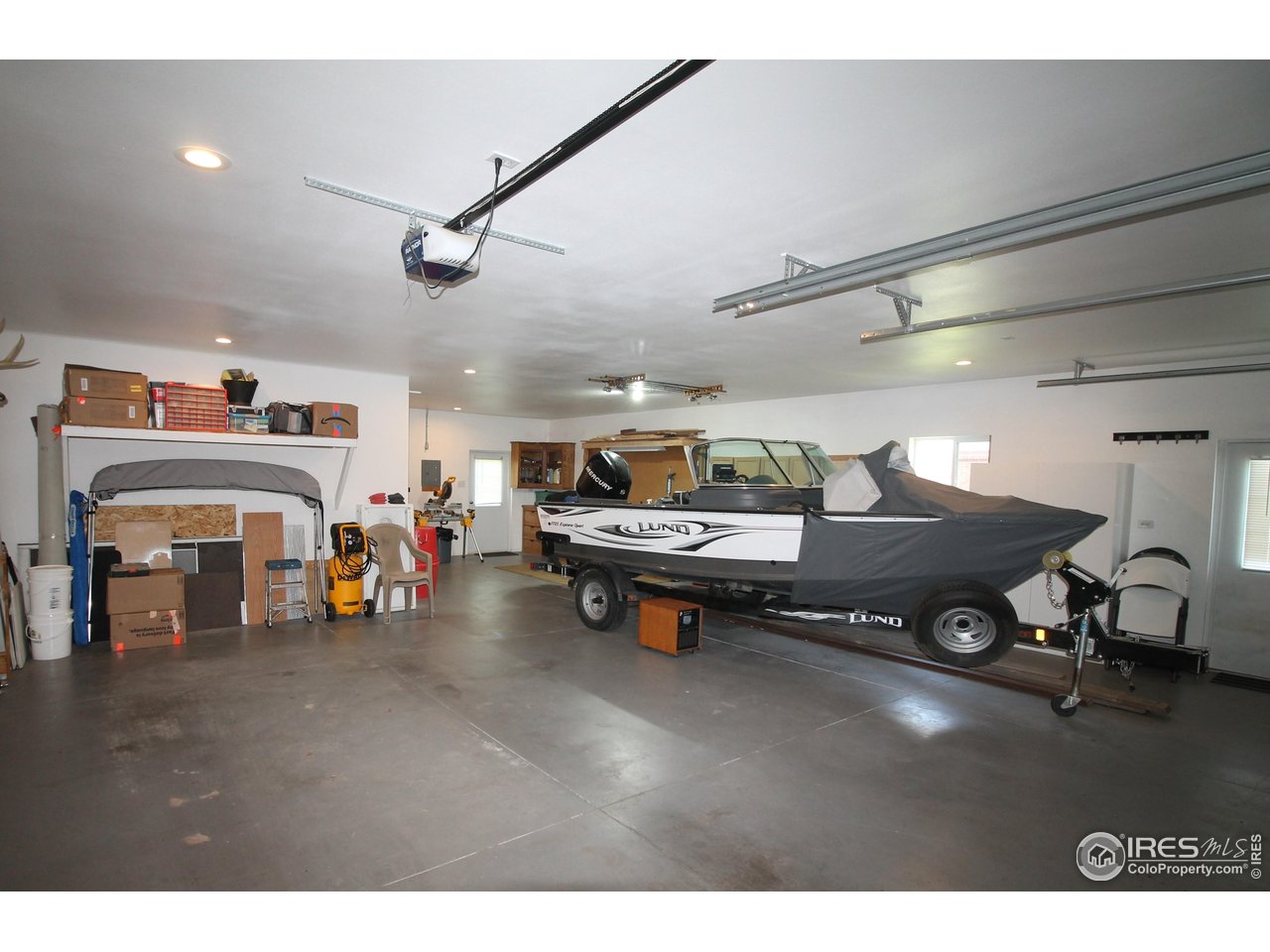 14363 Dakota Road Sterling, CO 80751 - Photo 30 of 40 a living room with furniture and a flat screen tv