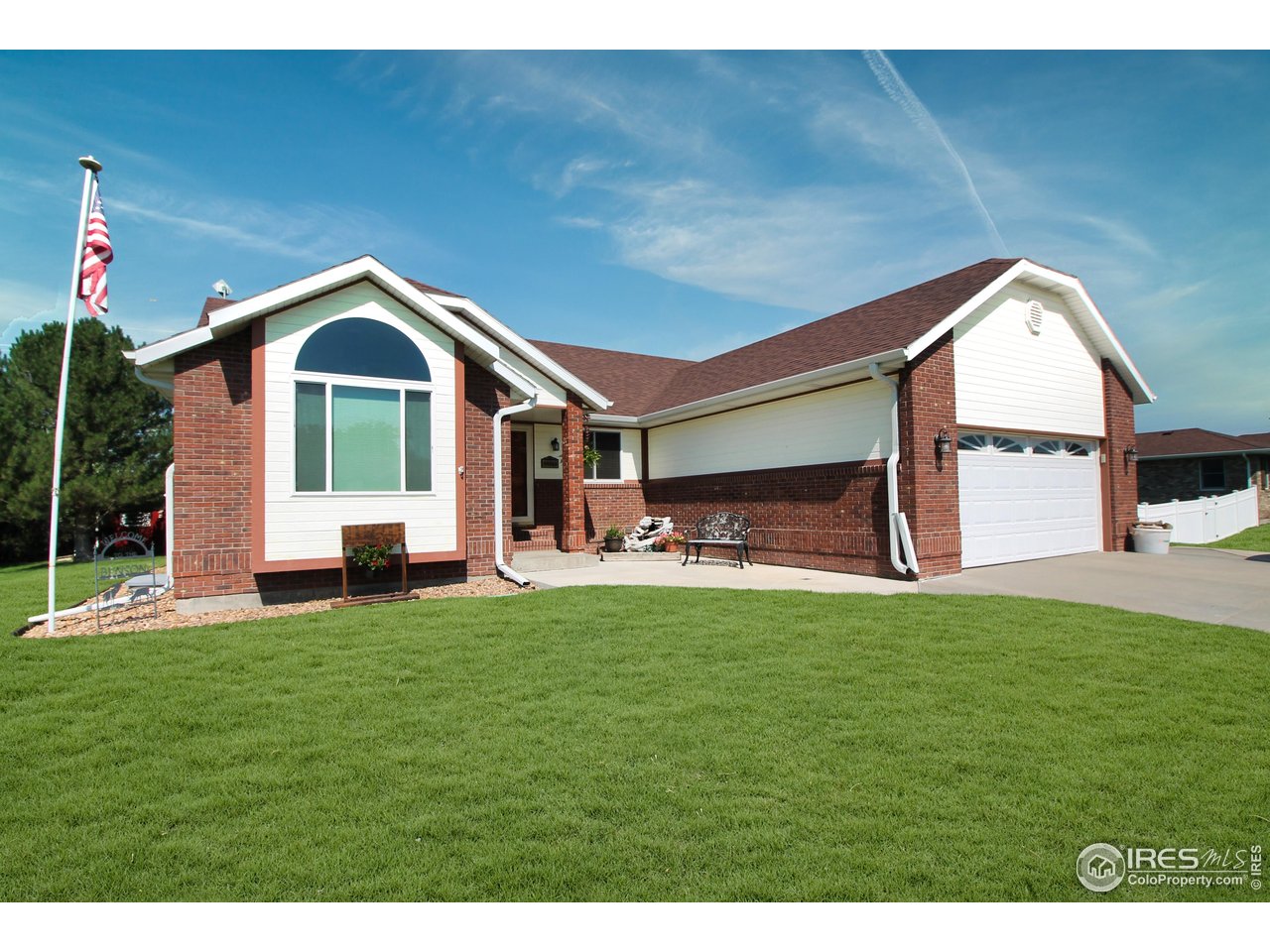 14363 Dakota Road Sterling, CO 80751 - Photo 39 of 40 a front view of a house with a yard