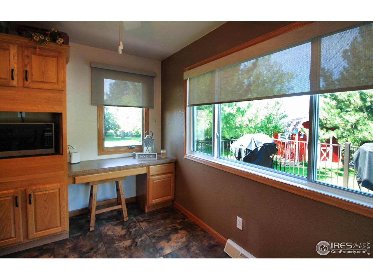 14363 Dakota Road Sterling, CO 80751 - Photo 5 of 40 a living room with a large window a table and chairs