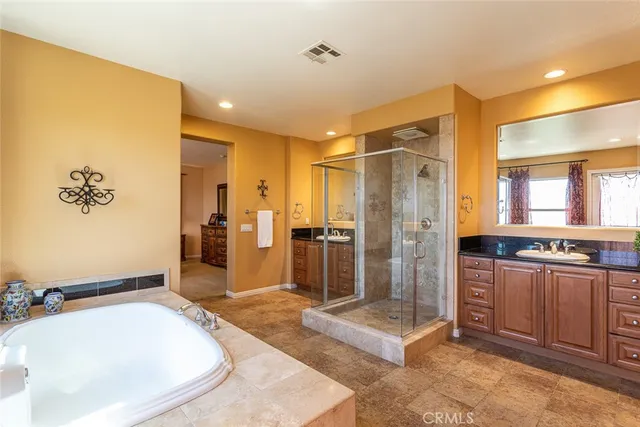 a view of a balcony with chairs