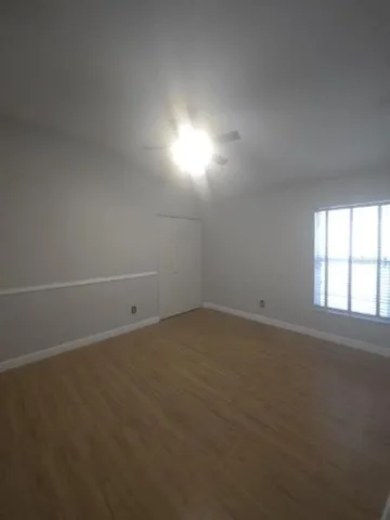 a bathroom with a bathtub and a toilet