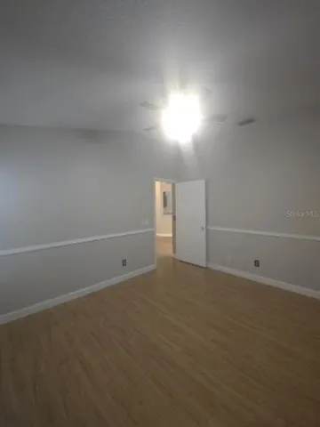 an empty room that has a window