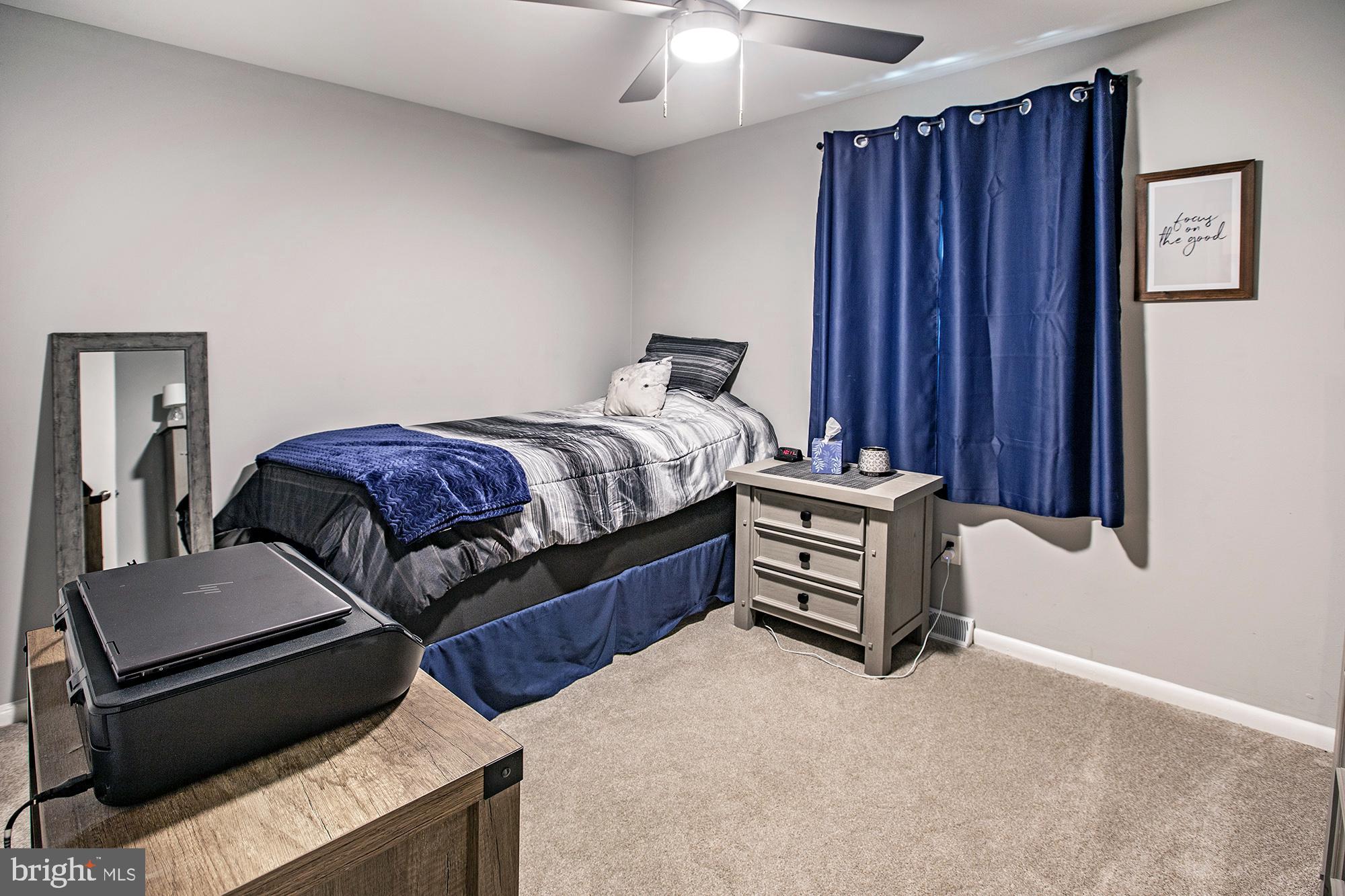10 Lafayette Road Pennsville, NJ 08070 - Photo 17 of 22 a bedroom with a bed and a dresser