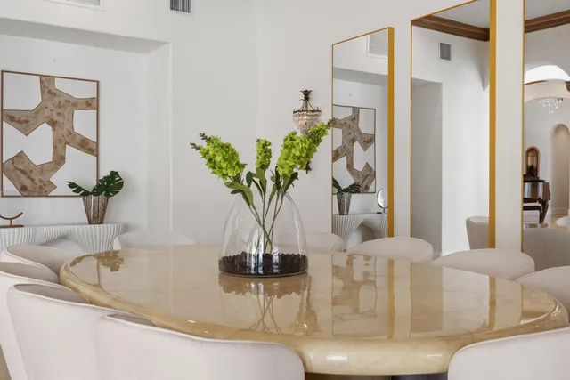 a view of a park with large trees