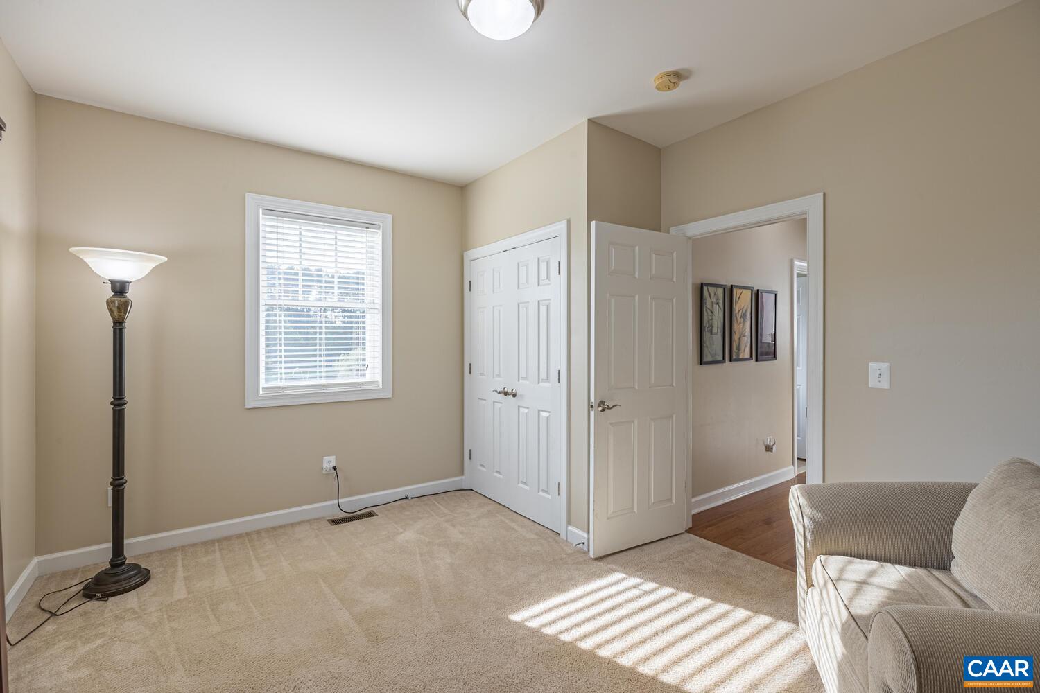 97 Wexford Ridge Road Ruckersville, VA 22968 - Photo 27 of 70 a living room with furniture and a window