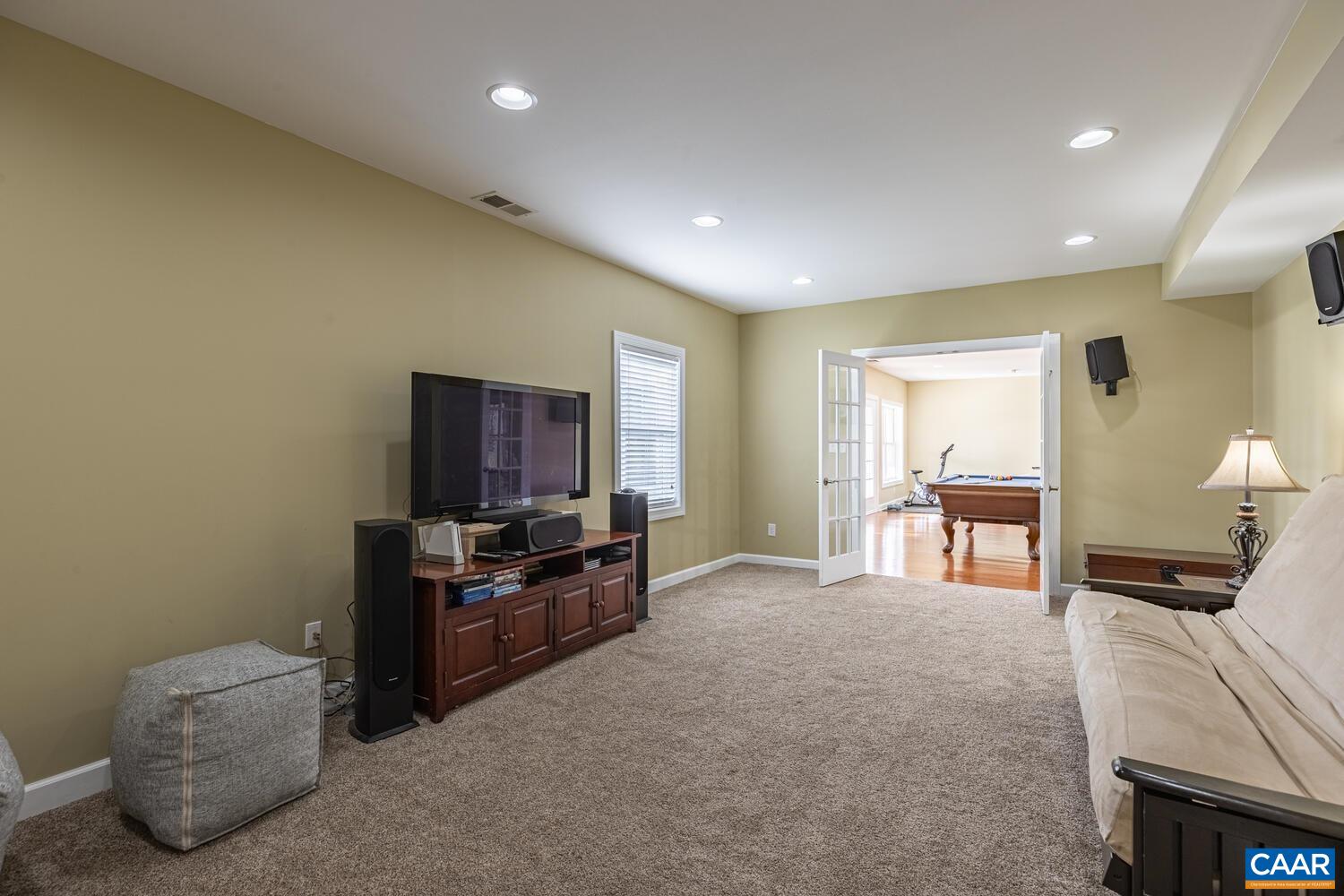 97 Wexford Ridge Road Ruckersville, VA 22968 - Photo 44 of 70 a living room with furniture and a flat screen tv