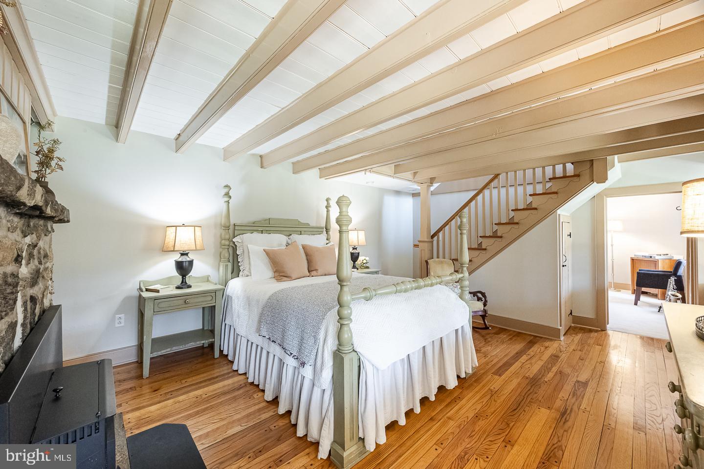 1640 Sheeder Mill Spring City, PA 19475 - Photo 41 of 63 a bedroom with bed and a wooden floor