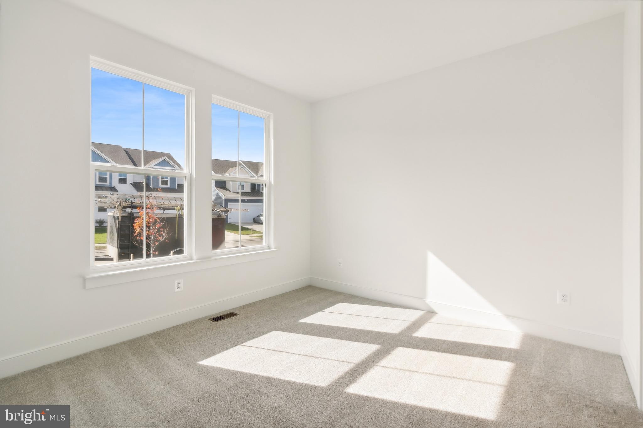 36435 Maple Ridge Lane Georgetown, DE 19947 - Photo 22 of 38 a view of an empty room with a window