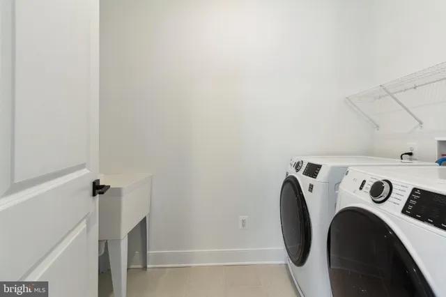 a view of a house with a swimming pool and a yard