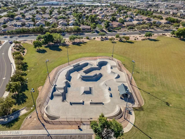 an aerial view of a house with a garden