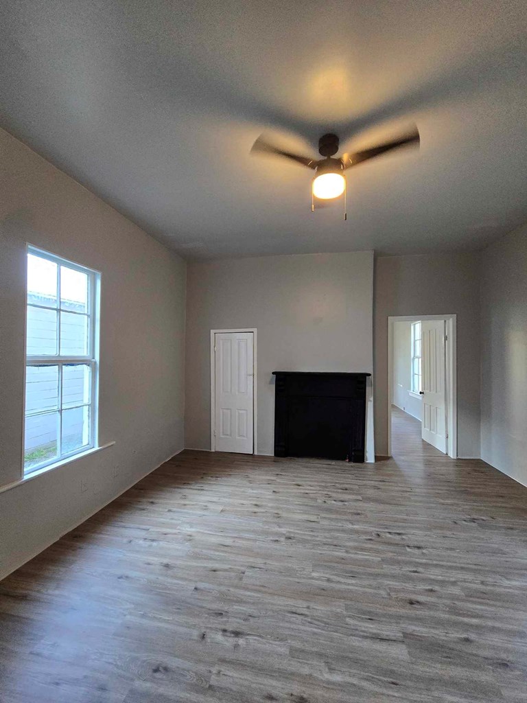 2808 9th Street Columbus, GA 31906 - Photo 2 of 8 a view of empty room with wooden floor