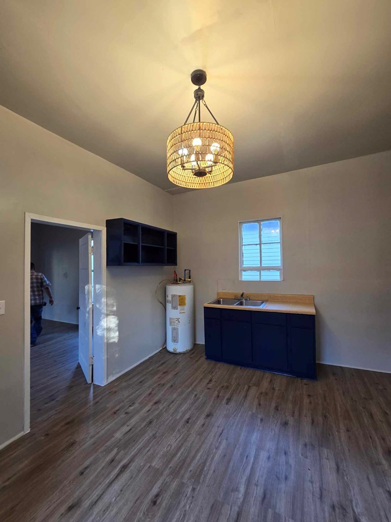 2808 9th Street Columbus, GA 31906 - Photo 6 of 8 a room with hard wood floors and a window