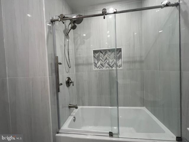 322 East Sterner Street Philadelphia, PA 19134 - Photo 11 of 25 a bathroom with a shower and a glass door shower