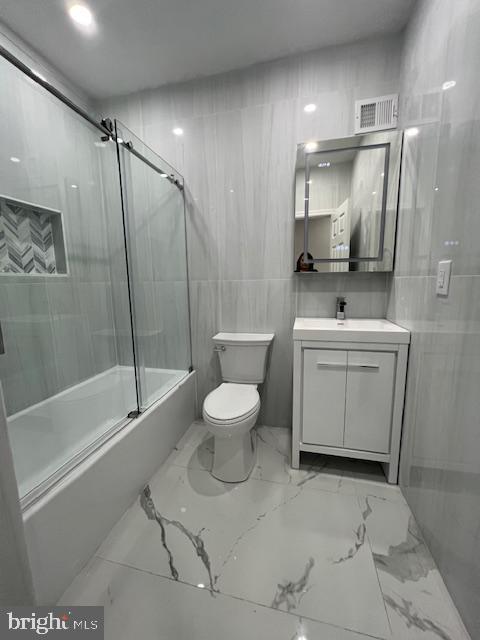322 East Sterner Street Philadelphia, PA 19134 - Photo 12 of 25 a bathroom with a toilet sink and mirror