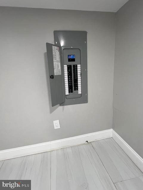 322 East Sterner Street Philadelphia, PA 19134 - Photo 21 of 25 a view of an empty room with wooden floor and a window