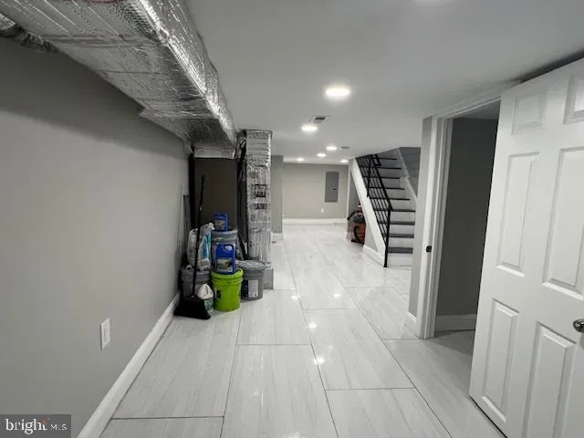 a view of a hallway with seating area