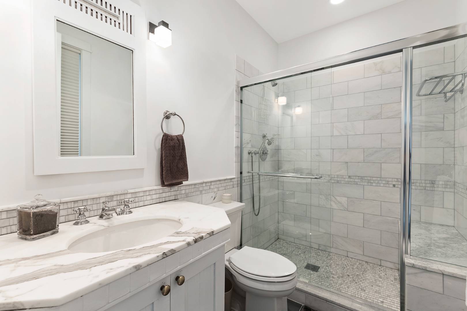 112 Georgica Close Road East Hampton, NY 11937 - Photo 22 of 46 a bathroom with a sink and a mirror