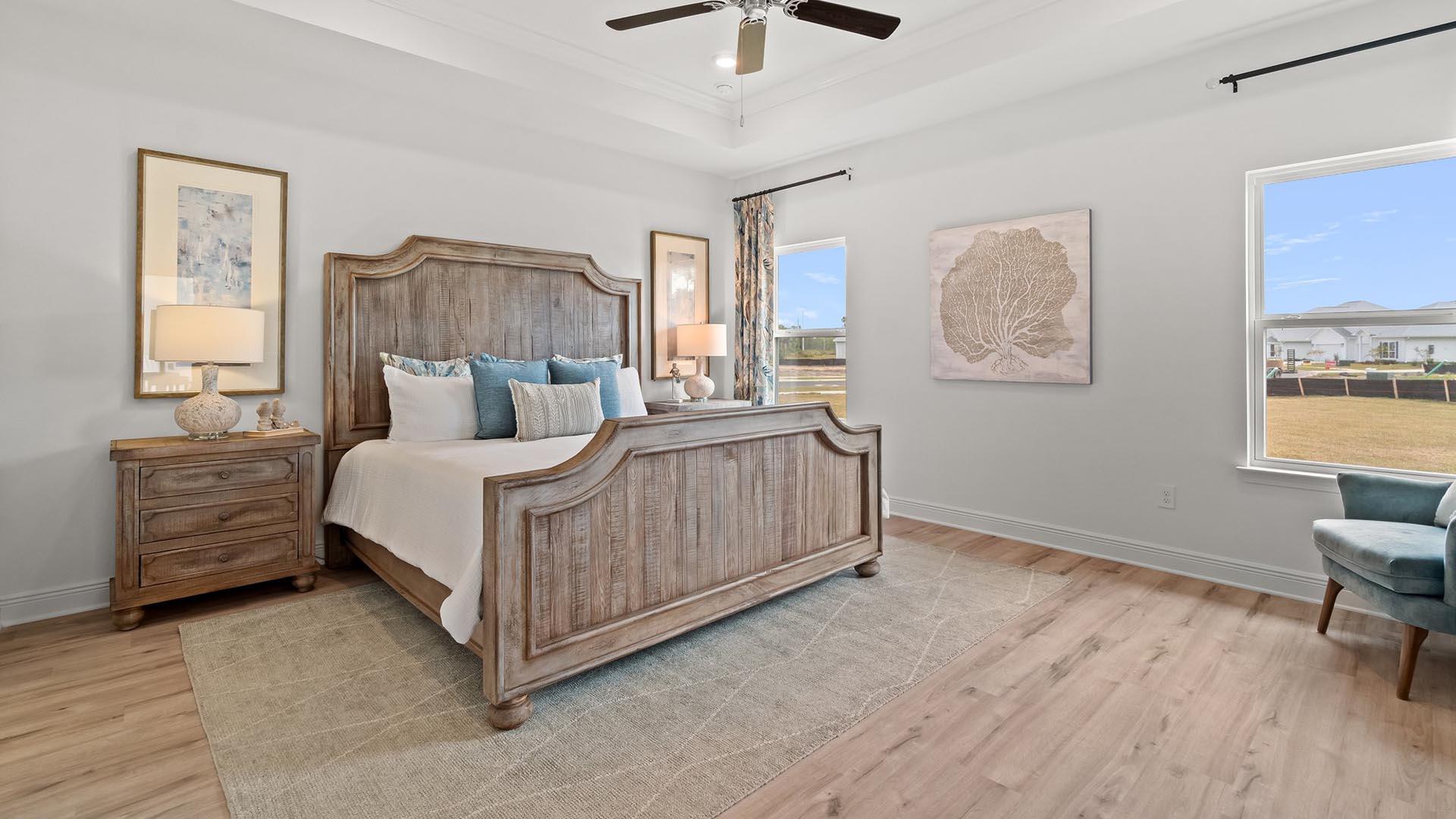 9 Blue Bell Circle Santa Rosa Beach, FL 32459 - Photo 15 of 32 a bedroom with a bed a couch and dresser