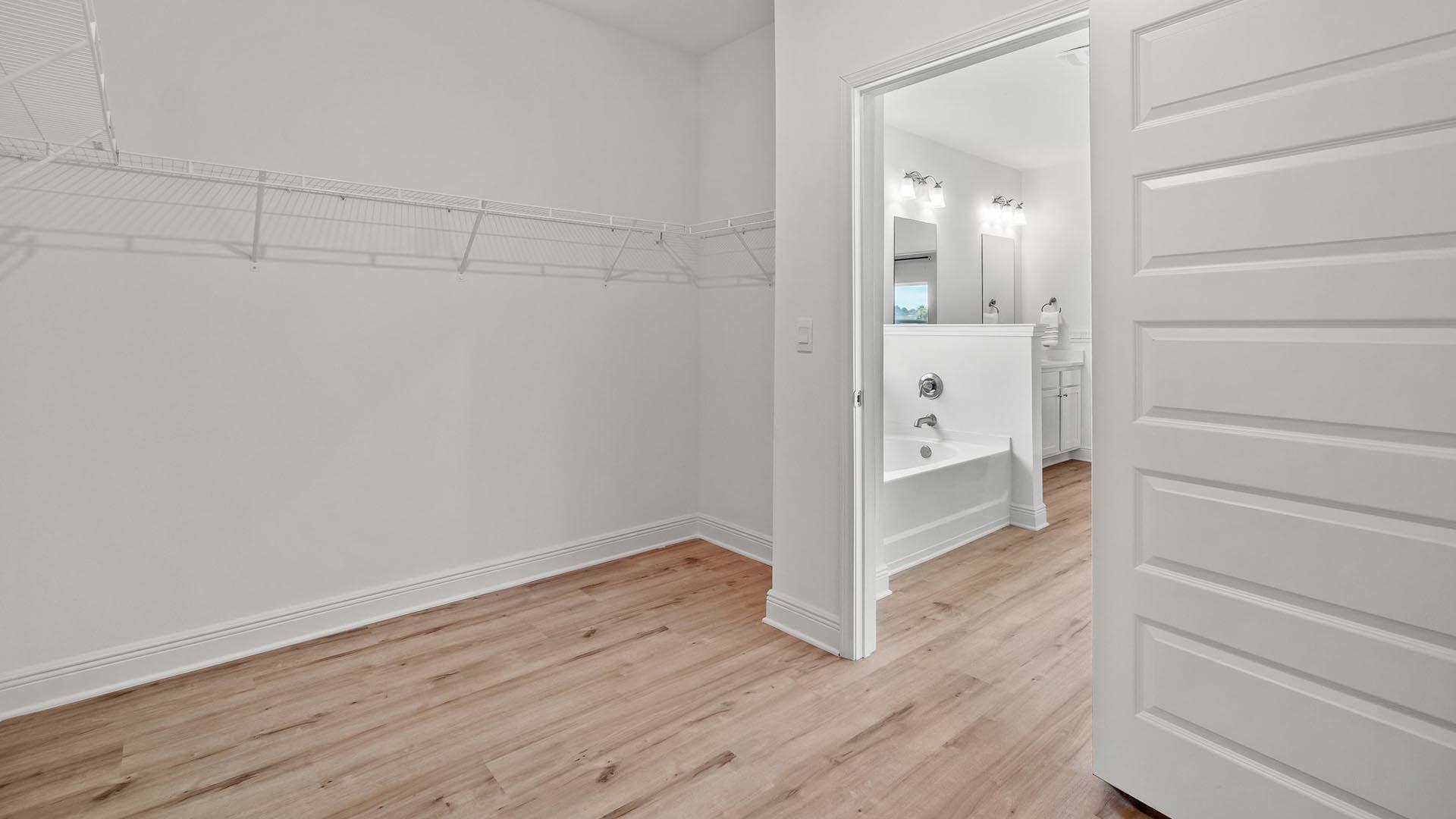 9 Blue Bell Circle Santa Rosa Beach, FL 32459 - Photo 20 of 32 a view of a hallway with wooden floor