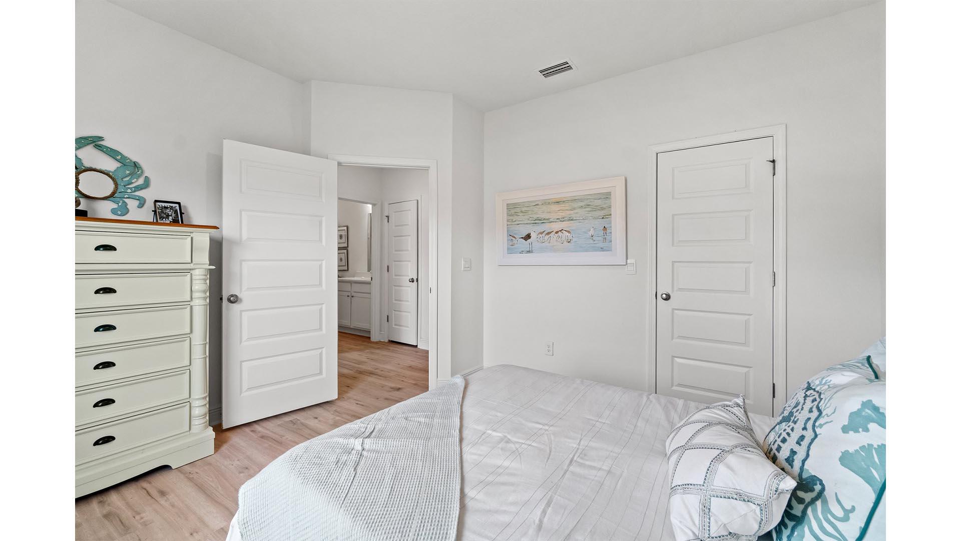 9 Blue Bell Circle Santa Rosa Beach, FL 32459 - Photo 29 of 32 a bedroom with a bed and a cabinets