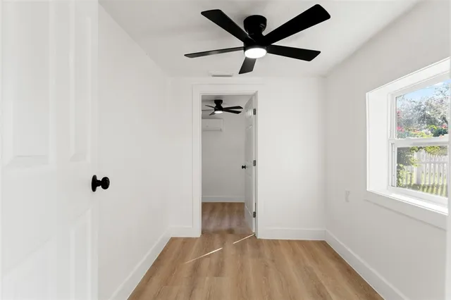 an empty room that has a window