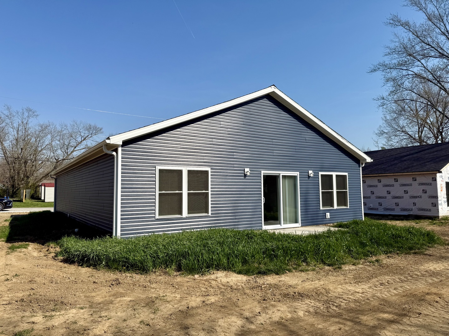1104 Midway Court Marion, IL 62959 - Photo 12 of 13 a front view of a house with a garden